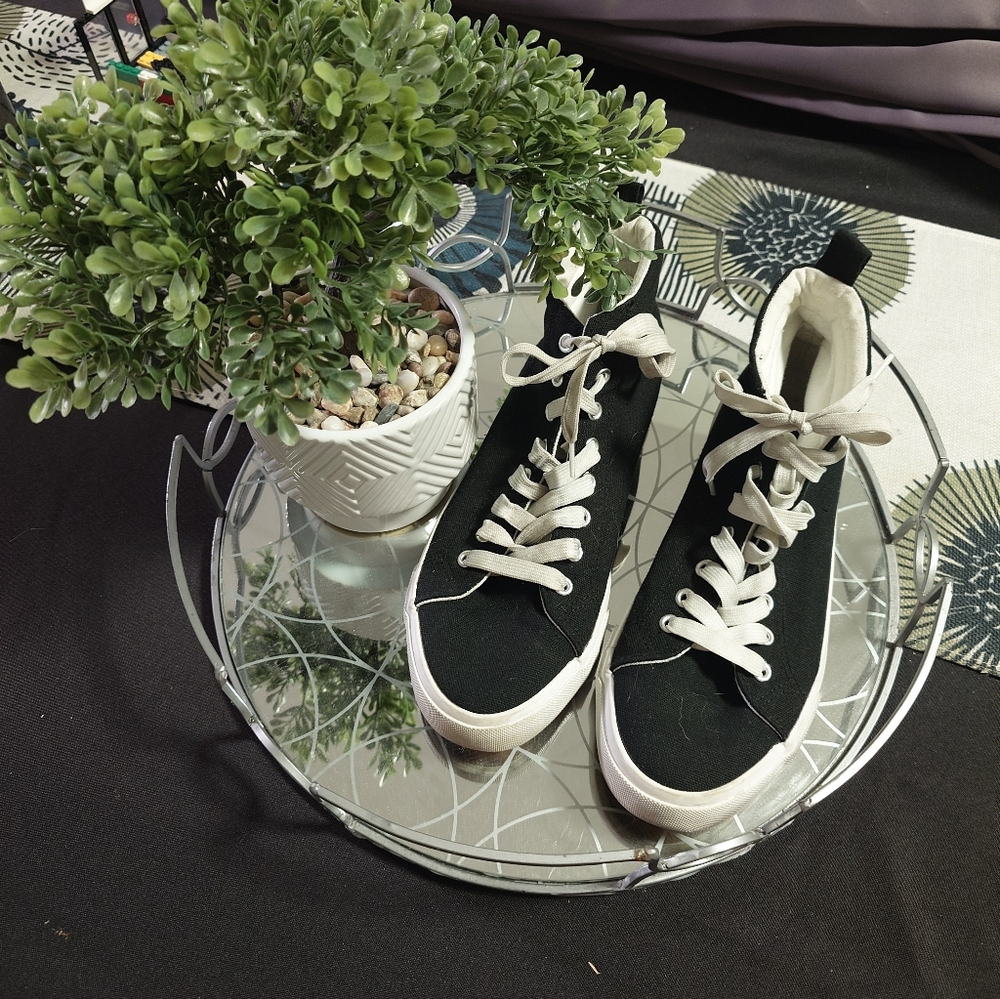 Step up your wardrobe! Black High-Top Sneakers with White Laces